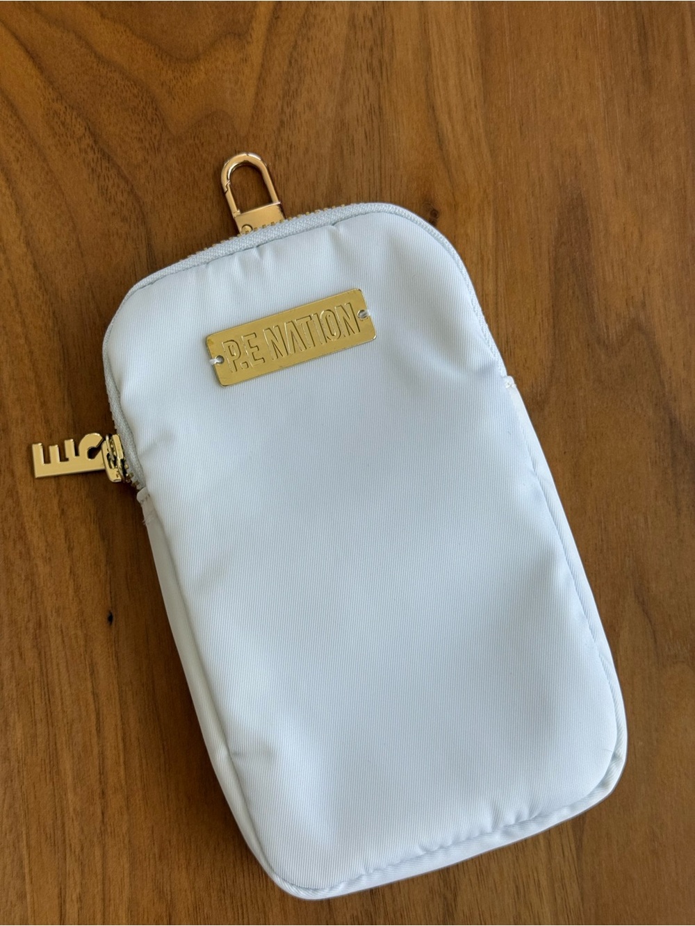 P.E Nation White Phone Pouch with Gold Plate and Clip